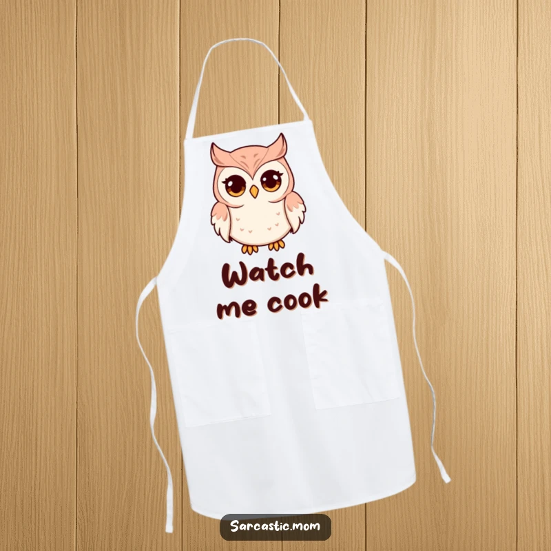 Funny and practical apron featuring an owl mom with wide eyes and a pursed beak. Perfect for kitchen duties with a side of humor.