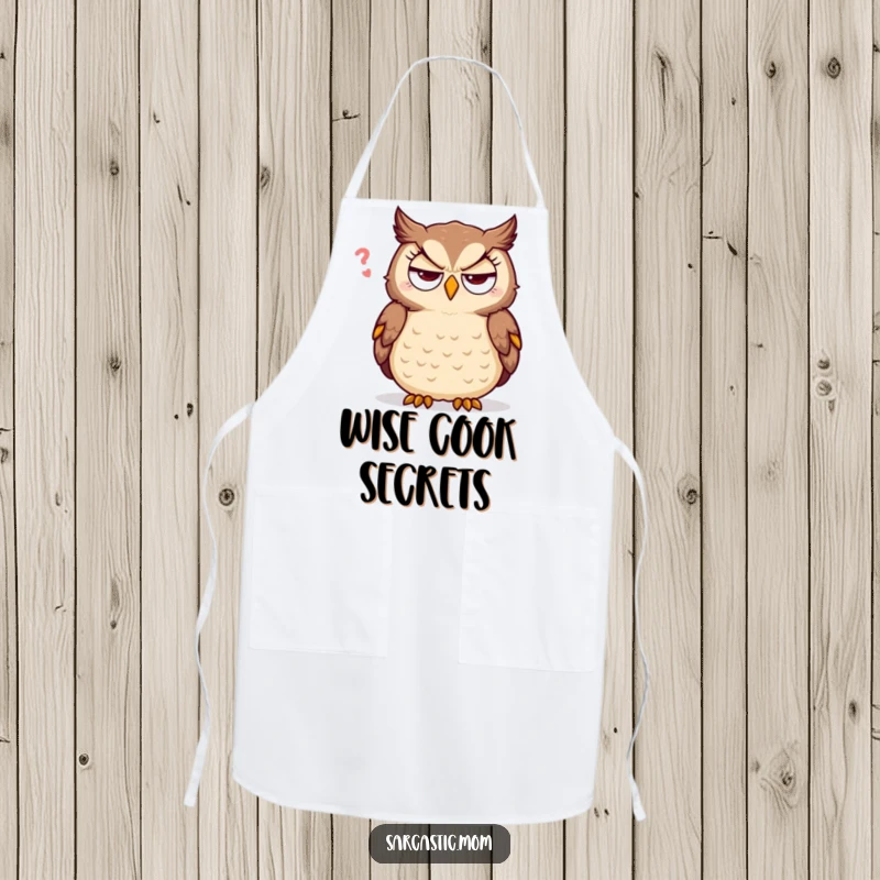 Funny sarcastic mother owl apron, rolling eyes humorously while cooking, perfect for a witty kitchen statement.