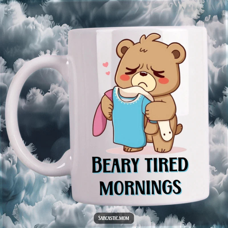 Funny Grumpy Bear Mom Mug, a mama bear sighing deeply while holding a large pile of laundry, embodying tired motherhood.