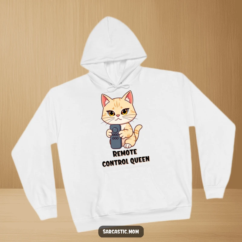 Funny Cat Mom Hoodie, determined woman holding a remote control, cozy and humorous for TV lovers, funny gift.