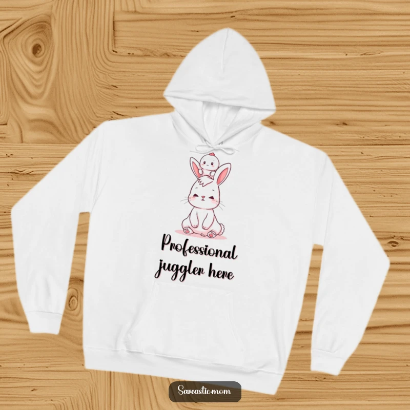 Funny hoodie featuring a bunny mom with a baby balanced on her head, perfect for cozy days and humorous mom vibes.