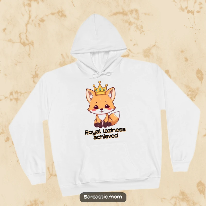 Funny fox cub hoodie, looking cozy while wearing a tiny, tilted crown, embodying playful royalty. A great funny gift.