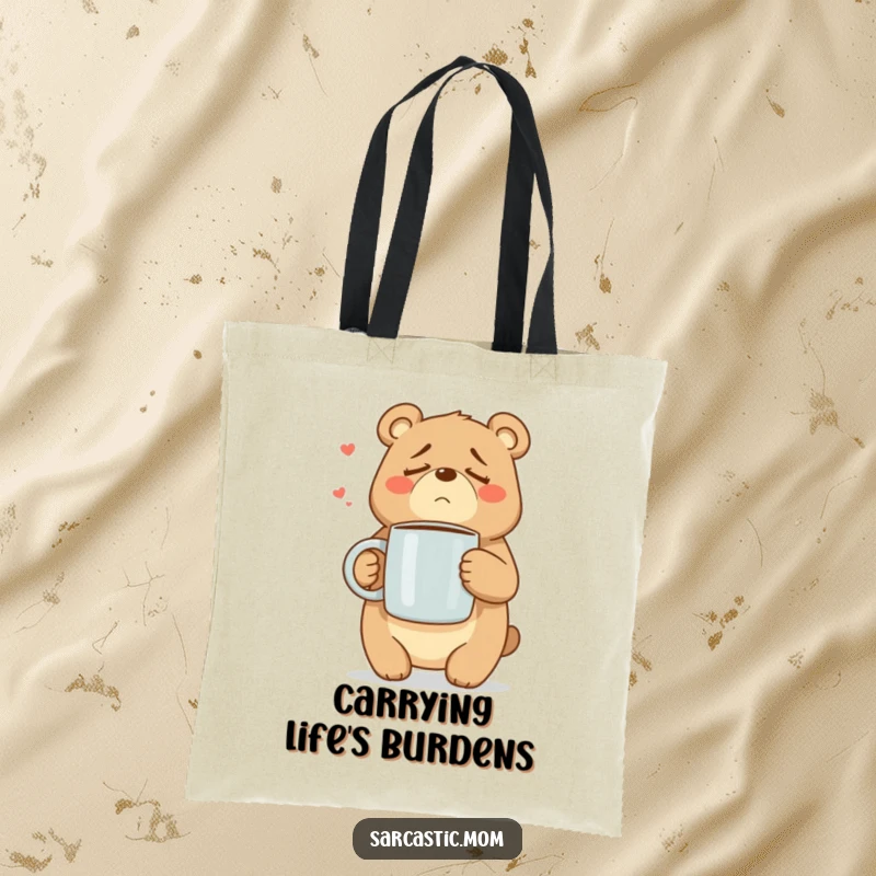Funny Mama Bear tote bag showing a weary bear mom with a huge coffee mug, perfect for carrying mom essentials.