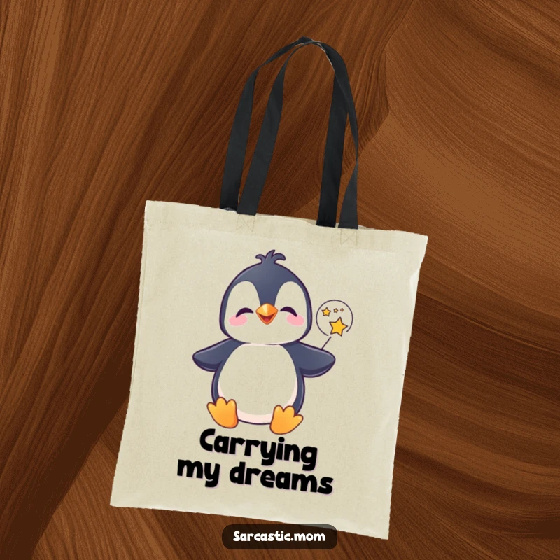Funny penguin tote bag, giggling and holding a star-filled speech bubble, ready for magical adventures. A practical funny gift.